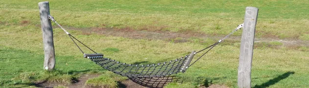 Rest area with a hammock in a communal green space